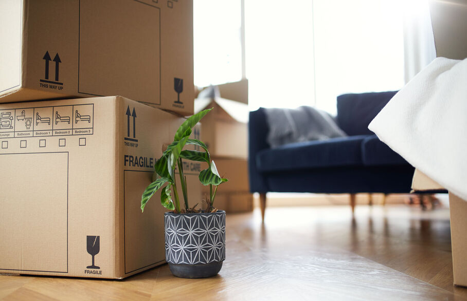 A room with packing boxes to move house