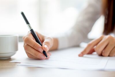 Lettings agent signing documents