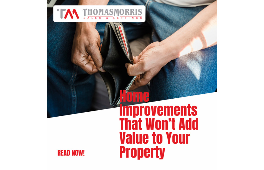 Someone holding open an empty wallet