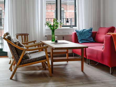 Red couch and chairs